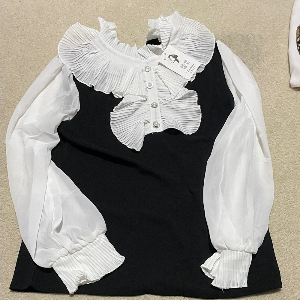 Chic Black and White Ruffled Blouse